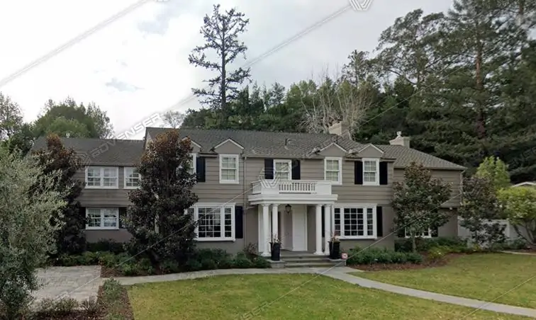 Large house with landscaped yard